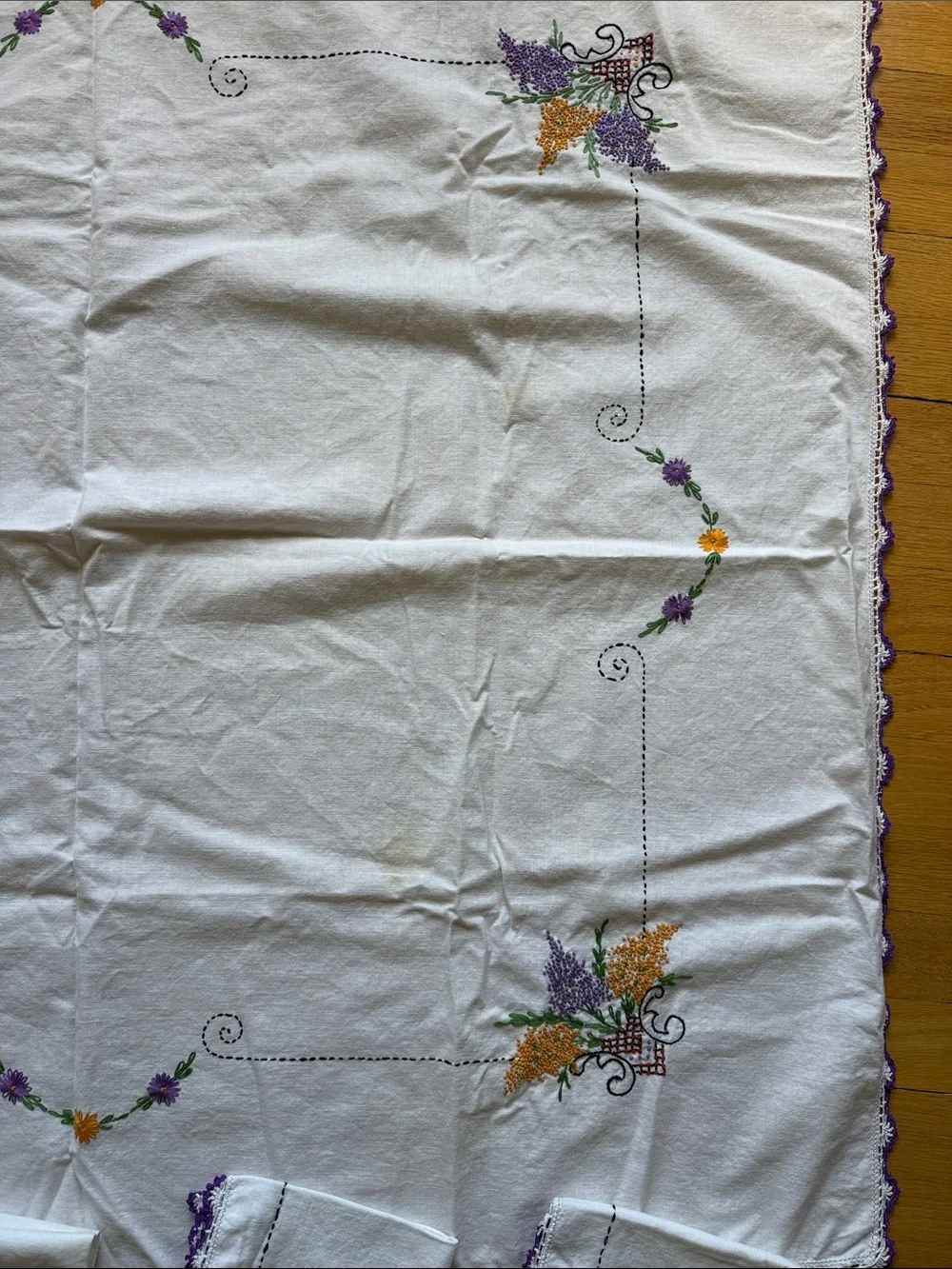 Hand-Embroidered White Tablecloth with Purple & Gold Floral Accents